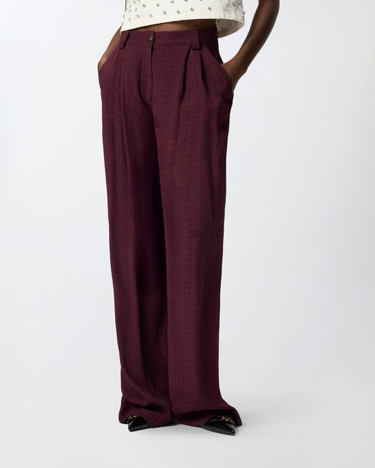 Trousers in jacquard with tie motif