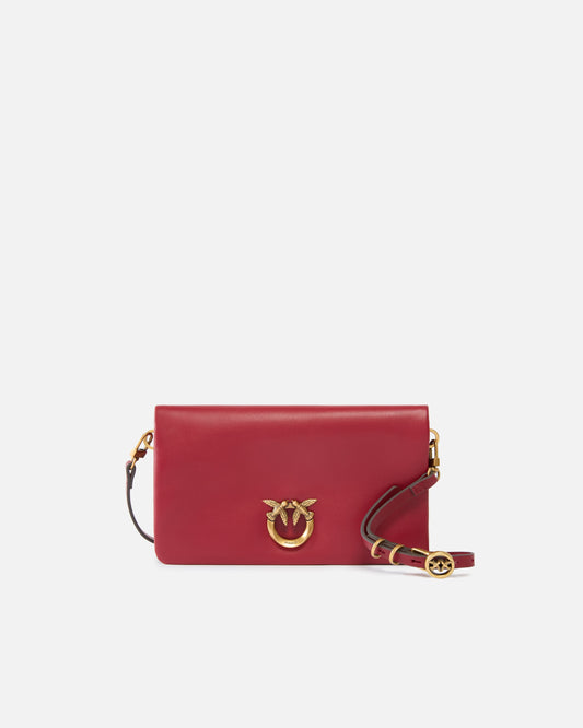 Love Bag Click Soft Horizontal Mini small crossbody clutch in leather
