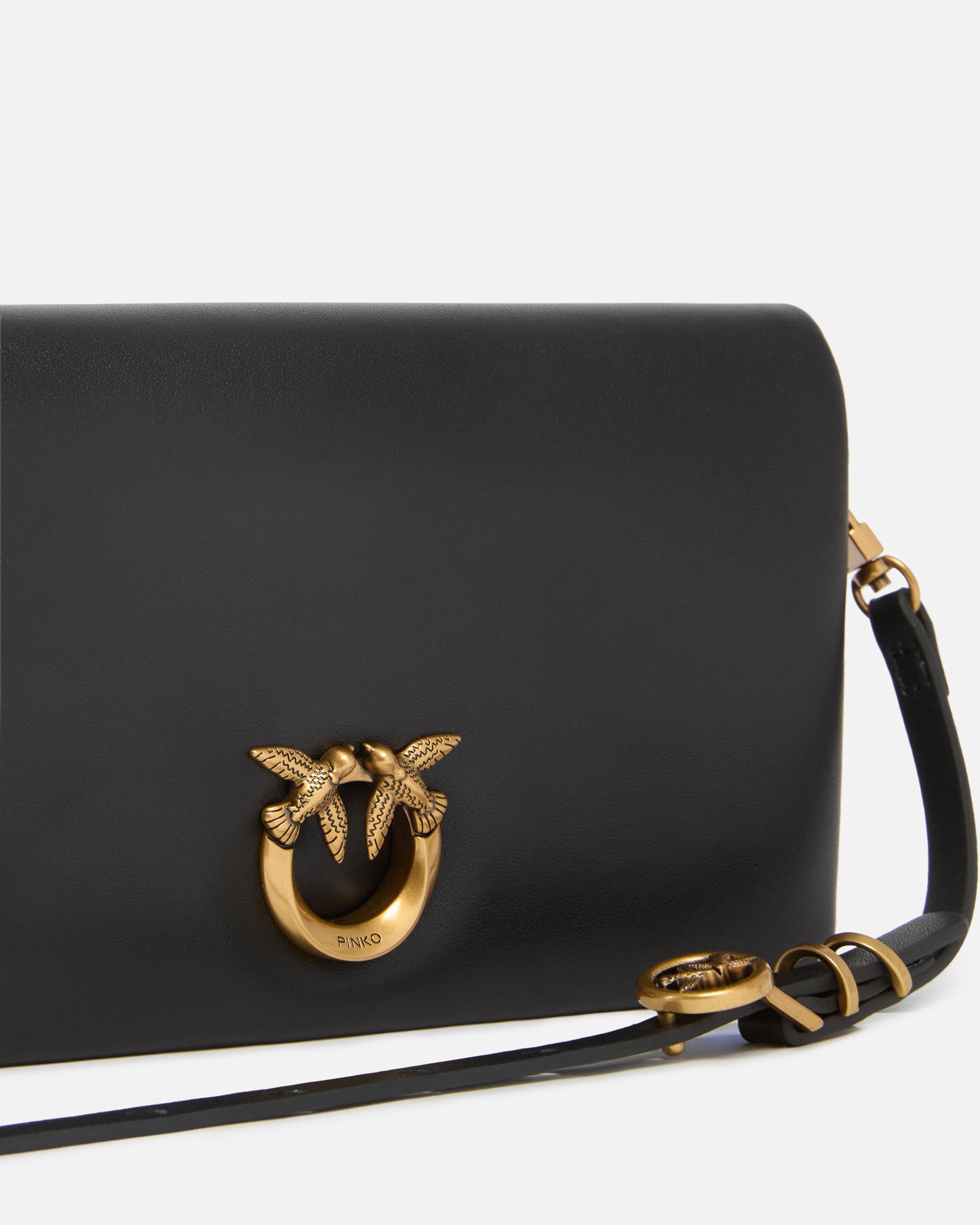 Love Bag Click Soft Horizontal Mini small crossbody clutch in leather