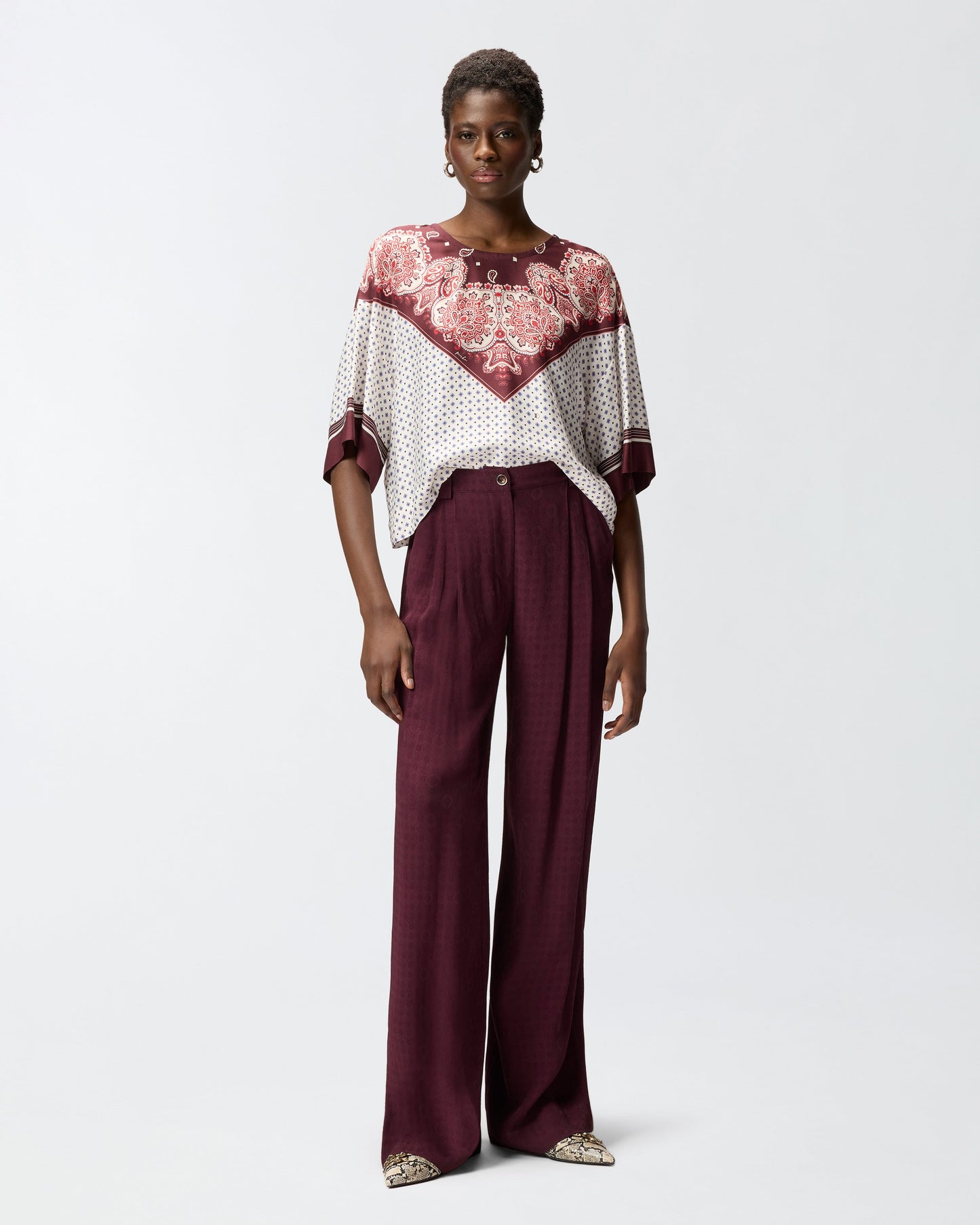 Blouse with tie motif and placed print