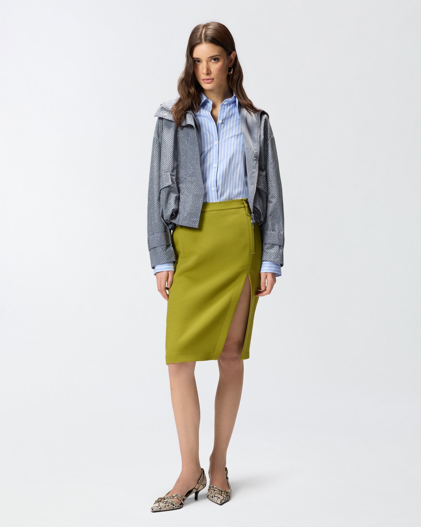 Slim-fitting calf-length skirt with slit