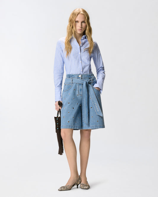 Denim shorts with eyelets and belt