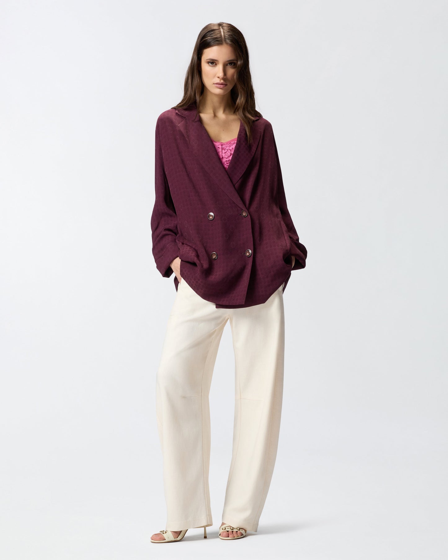 Double-breasted jacket with tie motif