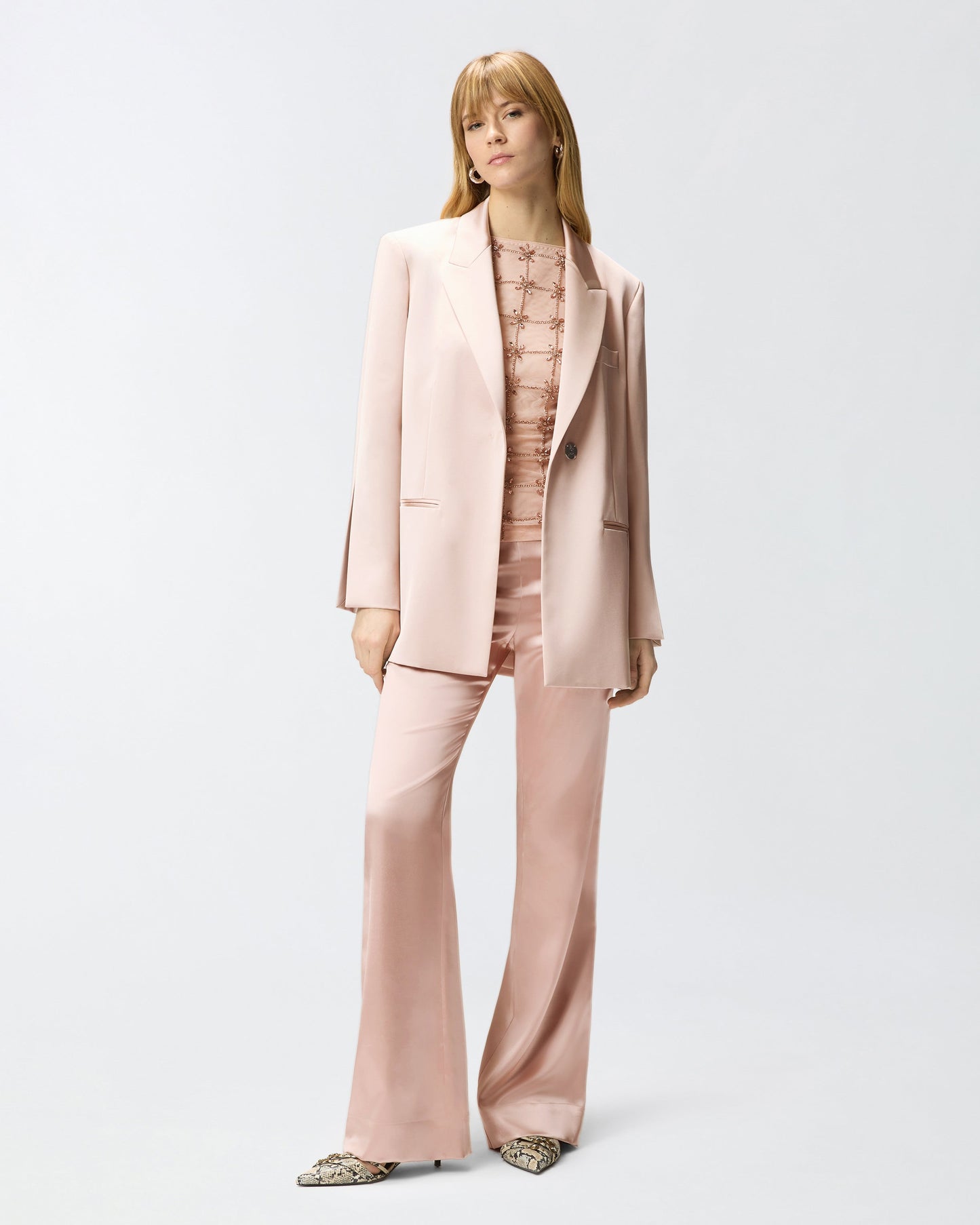 Flared trousers in satin