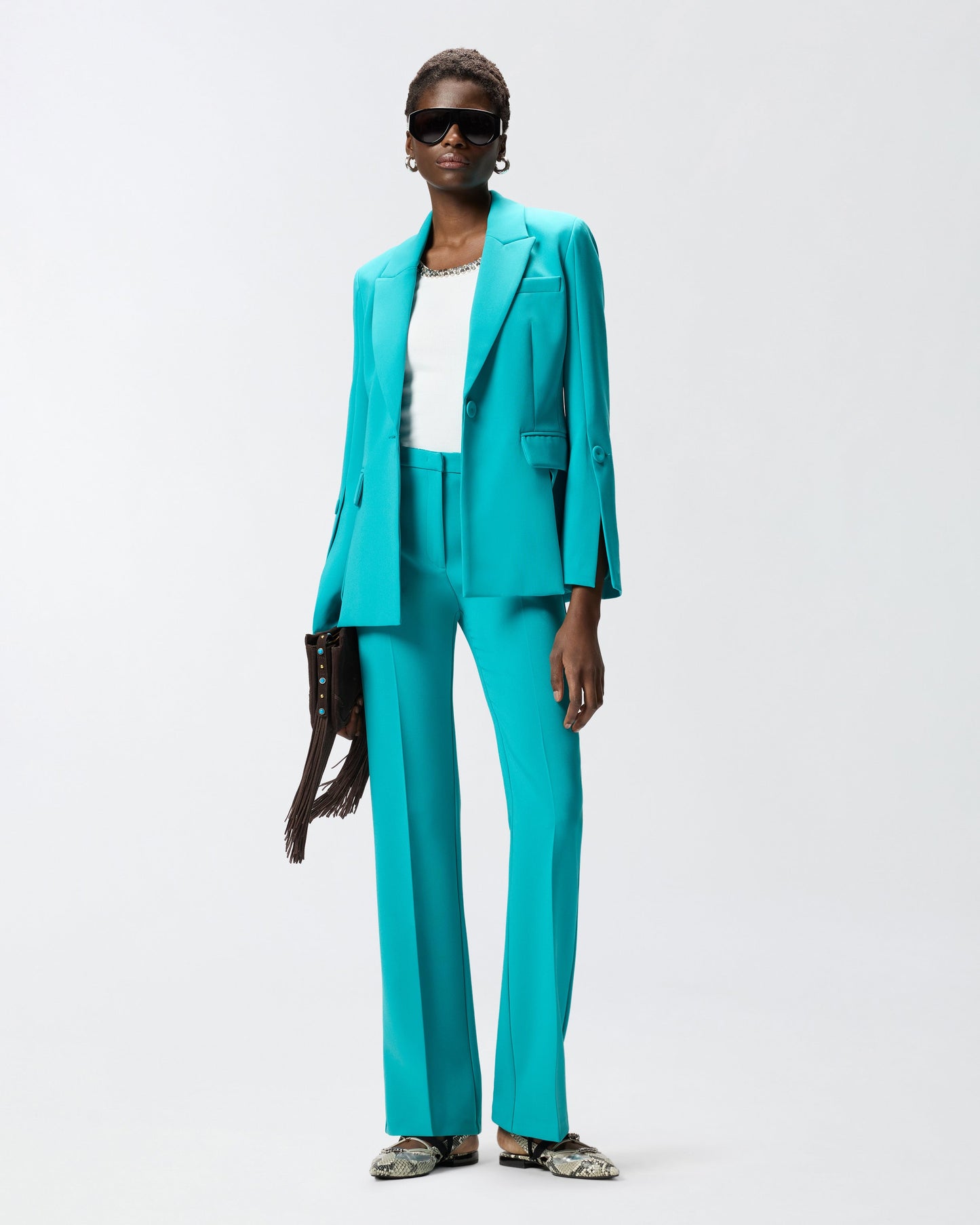 Trousers with pressed pleat detail