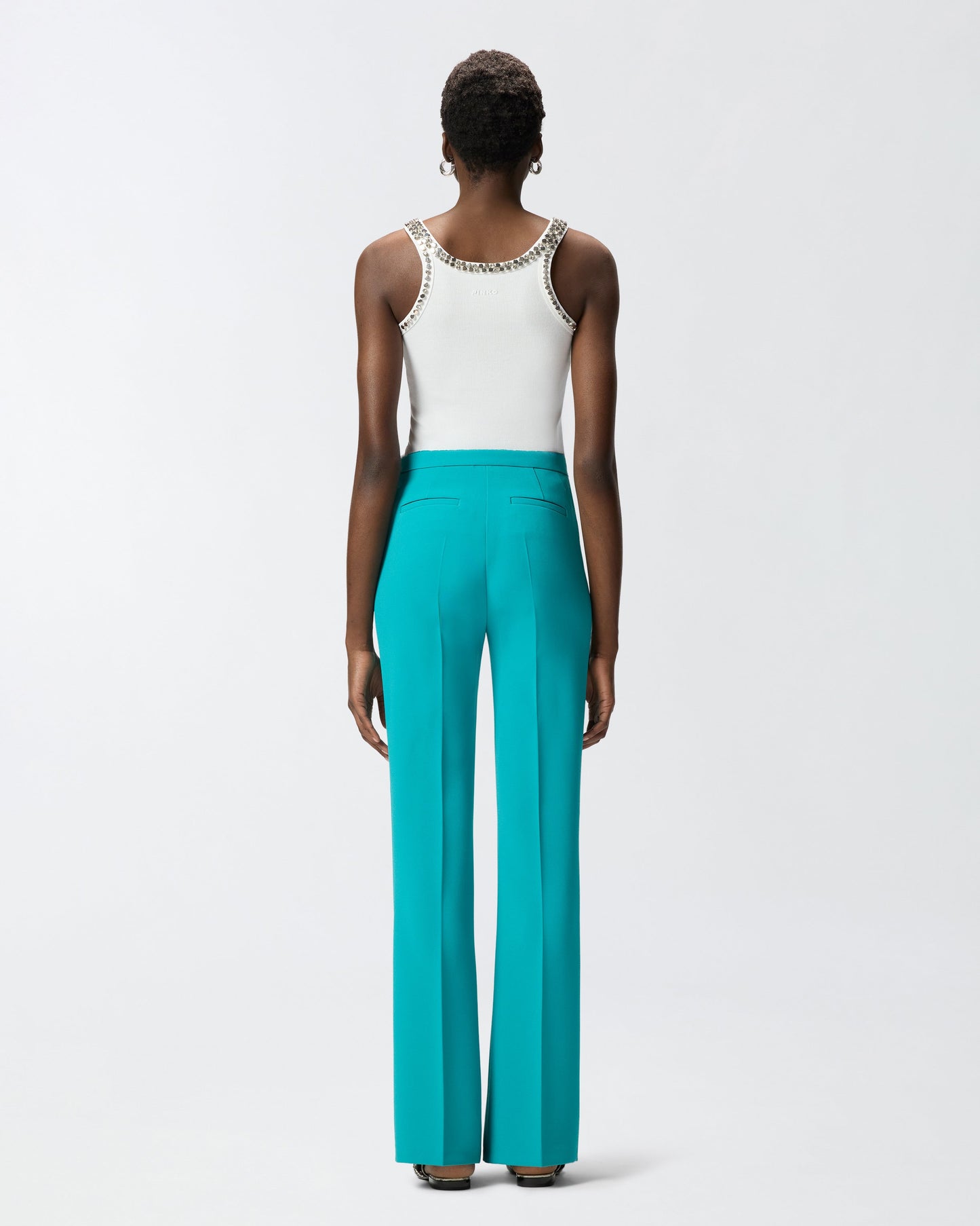 Trousers with pressed pleat detail