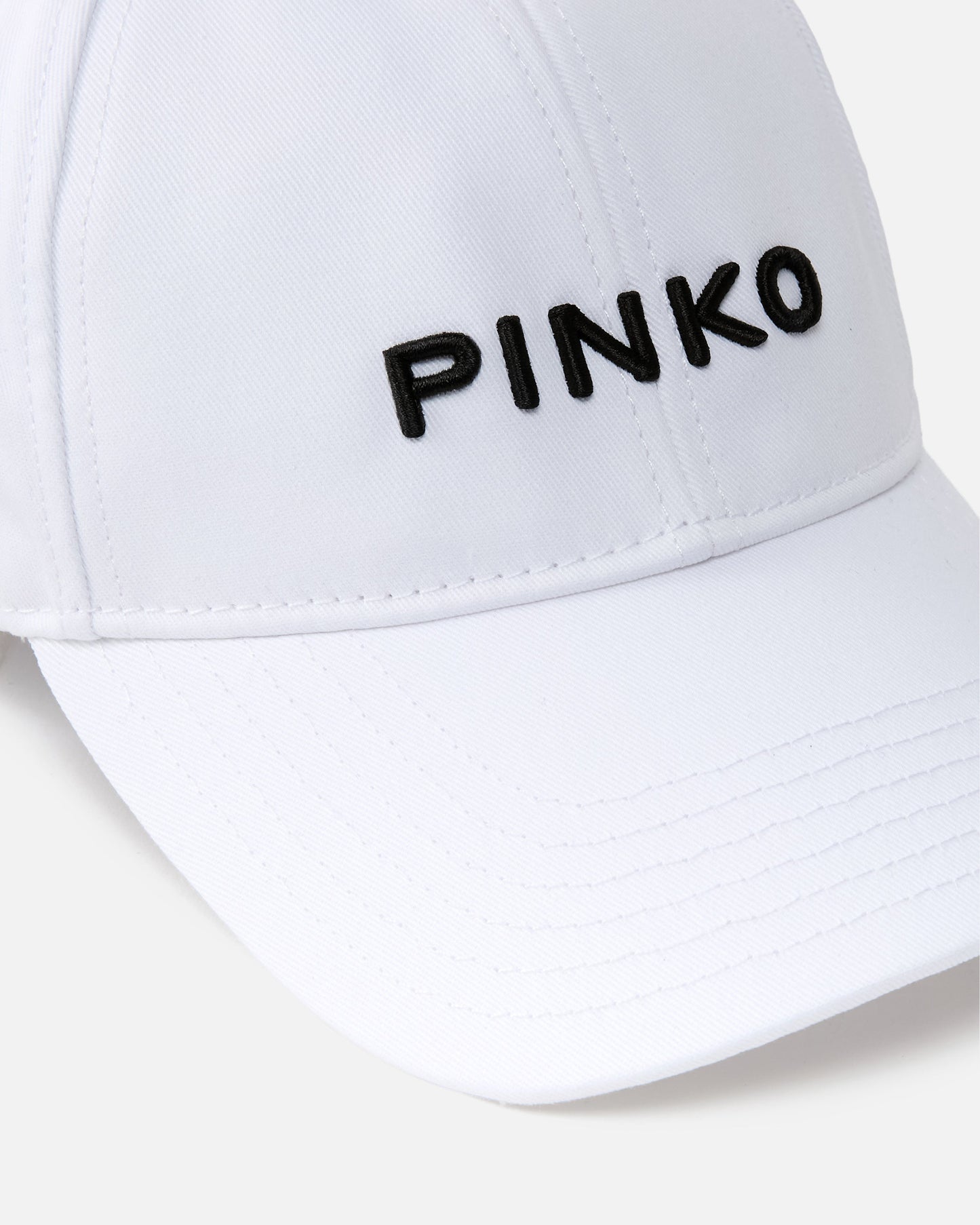 Cap with peak and embroidered logo