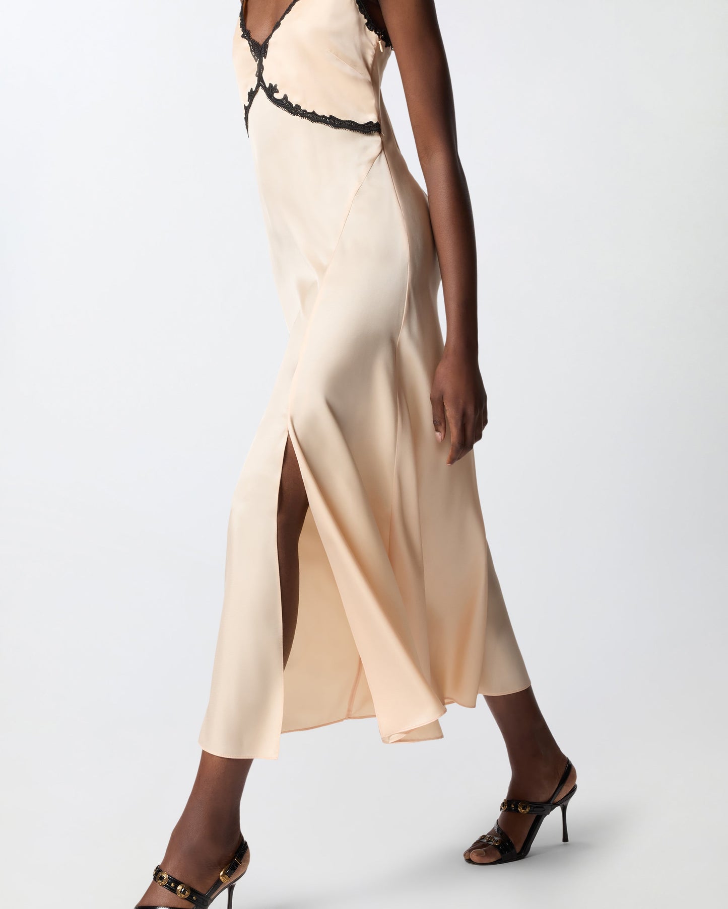 Long dress with lace inserts
