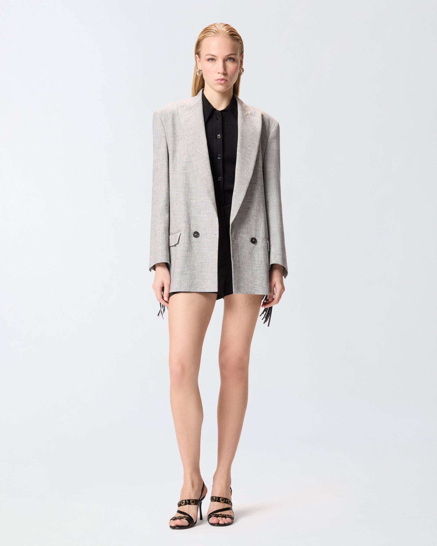 Double-breasted jacket with fringing
