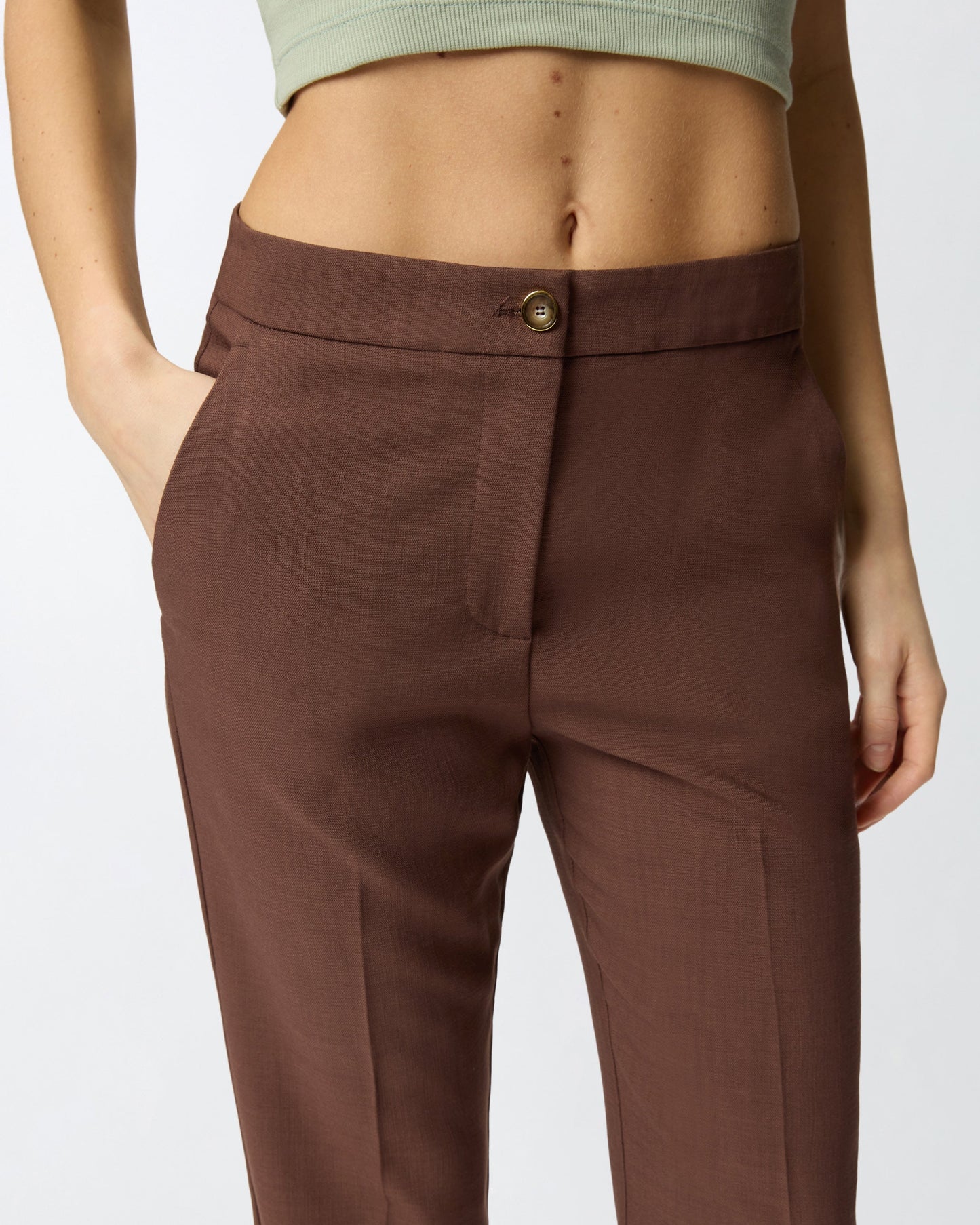 Trousers with pressed pleat detail