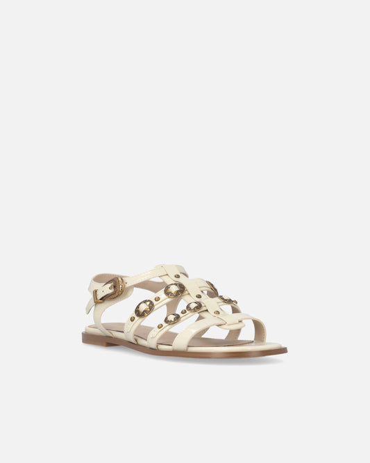 Flat sandals with straps and studs