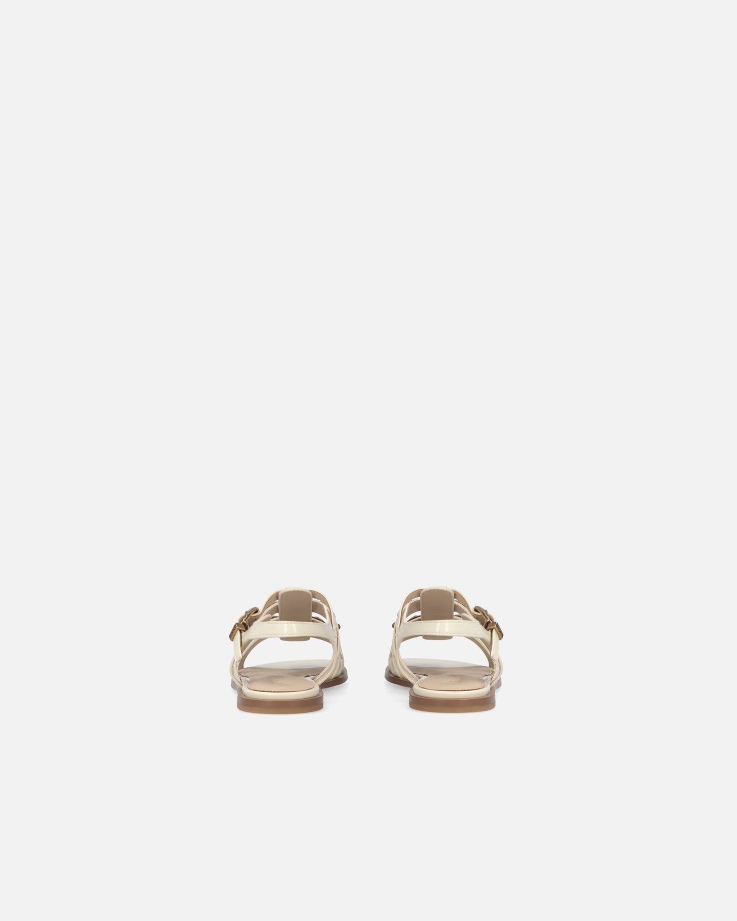Flat sandals with straps and studs
