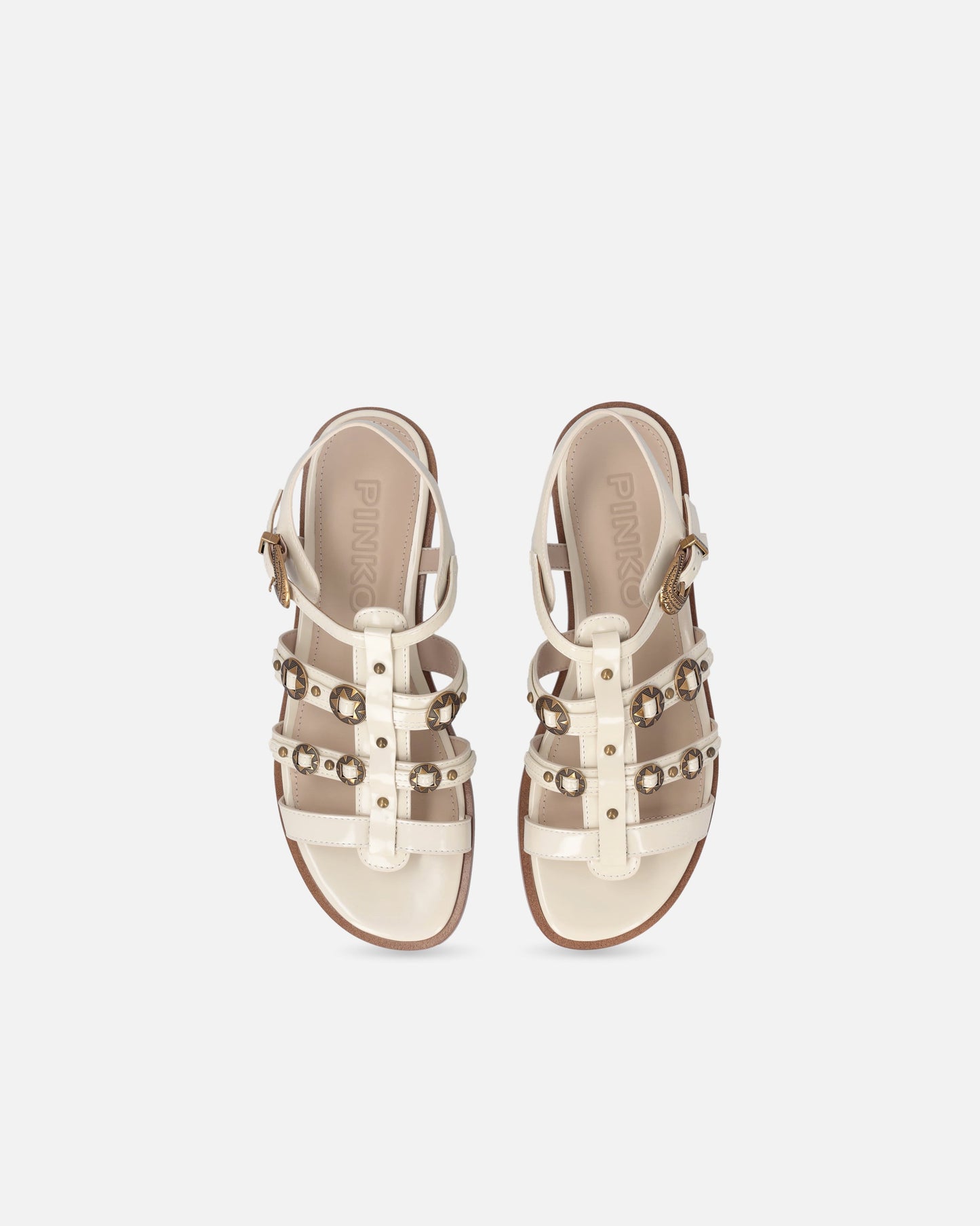 Flat sandals with straps and studs