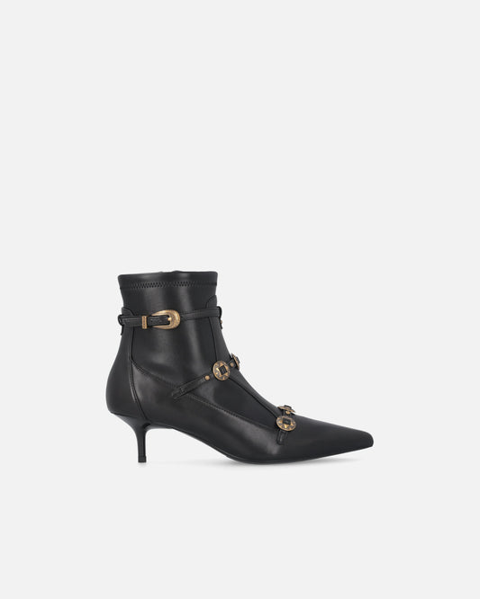 Boots with straps and jewel studs